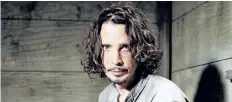  ?? CASEY CURRY/INVISION FILES ?? Chris Cornell plays guitar during a portrait session at The Paramount Ranch in Agoura Hills, Calif. Cornell, 52, who gained fame as the lead singer of the bands Soundgarde­n and Audioslave, died at a hotel in Detroit and police said Thursday that his...