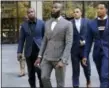  ?? RICHARD DREW — THE ASSOCIATED PRESS ?? Former NFL football player Anquan Boldin, left, Eagles’ Malcolm Jenkins, second left, Miami Dolphins’ Kenny Stills, third left, and San Francisco 49ers’ Eric Reid, leave NFL headquarte­rs after meetings, in New York, Tuesday.