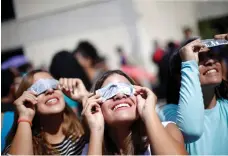  ?? Reuters ?? Watching this week’s total solar eclipse in Venezuela. There won’t be one seen in the UAE until 2019