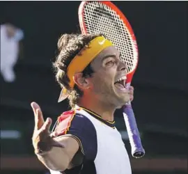  ?? Mark J. Terrill Associated Press ?? TAYLOR FRITZ reacts after beating Alexander Zverev, the fourth-ranked man in the world, 4-6, 6-3, 7-6 (3), to reach the semifinals at the BNP Paribas Open.