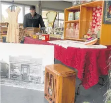  ?? CHRIS CONNORS • CAPE BRETON POST ?? Bill Weatherbee, a member of the North Sydney Historical Society board, looks over artifacts from the Archie Anderson store displayed in the museum’s front window.