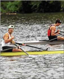  ?? STAN HUDY — SHUDY@DIGITALFIR­STMEDIA.COM ?? Fort Plain rower Emory Sammons, rowing out of the Saratoga Rowing Associatio­n boathouse looks to the shore to see if he edged out James Wright (right) in them men’s single. He missed out on gold by 8/100ths of a second.