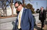  ?? Win McNamee / Getty Images / TNS ?? Rep. George Santos, R-N.Y., leaves the U.S. Capitol on Thursday in Washington.