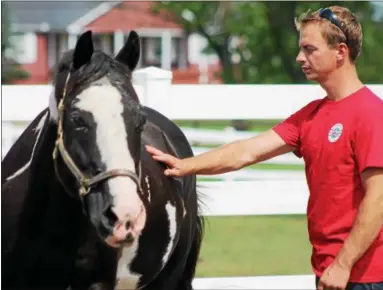  ?? KRISTI GARABRANDT — THE NEWS-HERALD ?? U.S. Marine veteran Jason Campbell first developed an interest in horses when he attended Operation Horses and Heros during the summer of 2016 to help him cope with anxiety and duty-related PTSD.