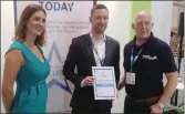  ??  ?? Pillar Healthcare Managing Director, Mark Whitney (centre), accepts the ‘Best Supplement & Herbal’ product award at The Pharmacy Show held in the NEC, Birmingham.