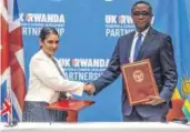  ?? ?? British Home Secretary Priti Patel (L), and Rwandan Minister of Foreign Affairs Vincent Biruta shake hands after signing an agreement.