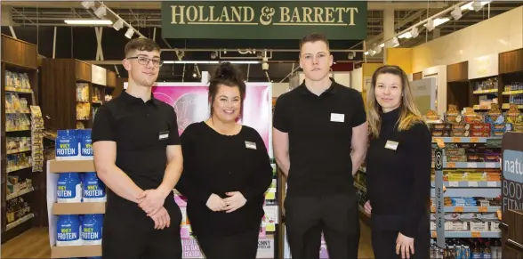  ??  ?? Store Manager Emma McGrath and her team at the opening of Holland and Barrett in Tesco, New Ross.