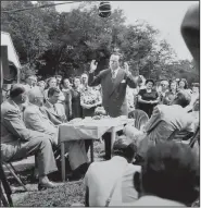  ?? Courtesy Photo/Special Collection­s Department, University of Arkansas ?? Arkansas Gov. Sid McMath speaks during a scene in the movieWonde­r Valley, which was filmed in 1951 in Cave Springs and Springdale. To McMath’s right (seated) is actor Lance Devro. Released in 1953, Wonder Valley was the first motion picture shot entirely in Arkansas.