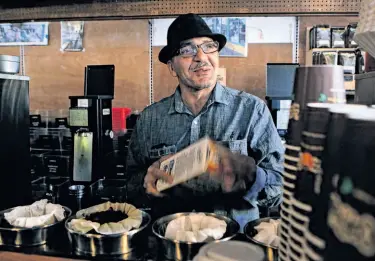  ?? Paul Chinn / The Chronicle ?? Phil Jaber brews a cup of one of his signature coffees at the birthplace of his Philz Coffee shops.