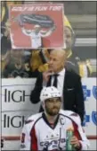  ?? GENE J. PUSKAR — THE ASSOCIATED PRESS ?? Washington’s Alex Ovechkin (8) sits on the bench in front of assistant coach Blaine Forsythe during Game 4 against the Penguins in Pittsburgh on Wednesday. The Penguins won. 3-2.