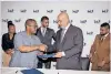  ?? ?? WLP general manager Mahmood Al Bastaki congratula­tes acting Gauteng Growth and Developmen­t Agency GCEO Simphiwe Hamilton after the signing of the Memorandum of Agreement between the GDDA and the WLP at the Saxon Hotel on Tuesday. | SUPPLIED