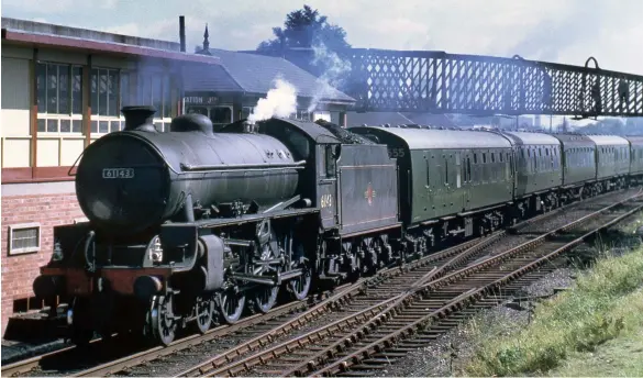  ?? Colour-Rail.com/BRE1385 ?? With a varied set of SR green stock, LNER Thompson ‘B1’ class 4-6-0 No 61143 passes Water Orton with 1O92, the 7am from Cleethorpe­s to Exmouth in August 1962. The service only ran in the peak summer period of 28 July to 1 September and was one of those rare workings where a train operates between two seaside resorts. It was in fact an extension to a normal Cleethorpe­s to Birmingham (New Street) service and drew its business from the industrial centres of Grimsby, Lincoln, Nottingham, Leicester, Nuneaton and Birmingham. In the 1950s the train ran via the S&D to and from Bournemout­h but from the summer of 1960 it was re-routed at Templecomb­e to serve the south Devon seaside resorts of Sidmouth and Exmouth, with the train splitting at Sidmouth Junction. From there, timetabled branch trains conveyed the through coaches to their destinatio­ns.