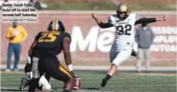  ?? ZACH BLAND/ GETTY IMAGES ?? Senior Sarah Fuller kicks off to start the second half Saturday.