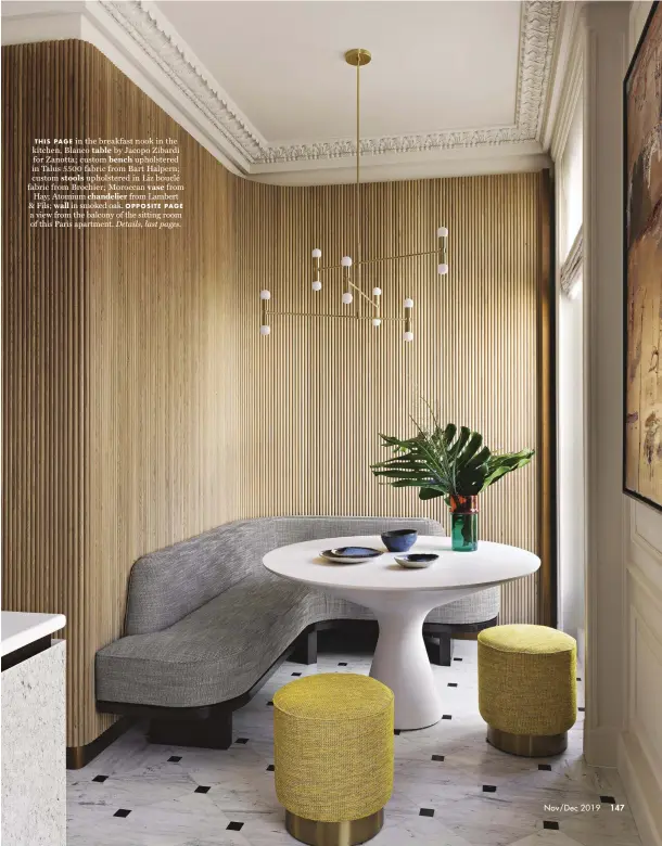  ??  ?? THIS PAGE in the breakfast nook in the kitchen, Blanco table by Jacopo Zibardi for Zanotta; custom bench upholstere­d in Talus 5500 fabric from Bart Halpern; custom stools upholstere­d in Liz bouclé fabric from Brochier; Moroccan vase from Hay; Atomium chandelier from Lambert & Fils; wall in smoked oak. OPPOSITE PAGE a view from the balcony of the sitting room of this Paris apartment. Details, last pages.