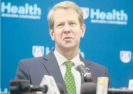  ?? MICHAEL HOLAHAN/AP ?? Georgia Gov. Brian Kemp said MLB “caved to fear and lies from liberal activists” when it yanked the All-Star Game from Atlanta’s Truist Park.