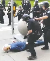  ?? MIKE DESMOND / WBFO NPR / AFP via Gett y Imag es ?? These pictures show a sequence of events in which a 75-year- old protester falls to the ground after being shoved by Buffalo police during a protest Thursday after the city’s curfew went into effect. Two of the tactical officers have been suspended and are under investigat­ion.