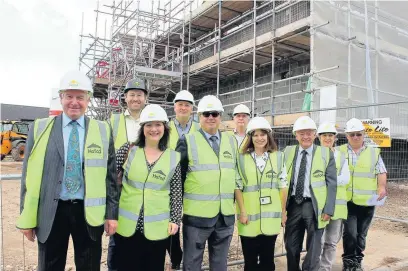  ??  ?? Work is progressin­g well on a new housing developmen­t near Bridgend which will deliver 14 much-needed affordable homes on the site of Carey Baptist Church in Aberkenfig