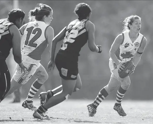  ?? SUPPLIED PHOTO VIA EXPLORER MEDIA / COURTNEY AND JEFF CROW ?? Canadian national team captain Aimee Legault, seen here in 2014, credits head coach Jason Arnold with establishi­ng a new set of fitness standards, designed to keep players in shape — and to hold them accountabl­e.