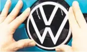  ?? JENS MEYER AP FILE ?? A report that Volkswagen would change its brand name to “Voltswagen” could be seen as more than a joke — it could land it in trouble with the SEC.