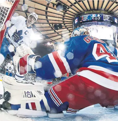  ?? BRUCE BENNETT GETTY IMAGES ?? Leafs centre John Tavares watches the tip of a Mitch Marner shot elude Rangers goalie Alexandar Georgiev in the second period.