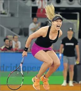  ?? Picture: REUTERS ?? HAIR-RAISING VICTORY: Eugenie Bouchard of Canada celebrates after beating Russia’s Maria Sharapova in a second-round match at the Madrid Open in Spain on Monday