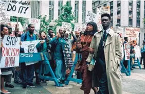  ?? ATSUSHI NISHIJIMA/NETFLIX ?? Sharon Salaam (Aunjanue Ellis, left), and son Yusef (Ethan Herisse), one of the five men collective­ly known as the Central Park Five.