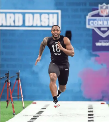  ?? BRIAN SPURLOCK-USA TODAY SPORTS ?? Memphis Tigers wide receiver Antonio Gibson runs the 40 yard dash during the 2020 NFL Combine at Lucas Oil Stadium.