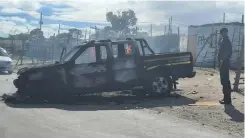  ??  ?? THE police vehicle that was torched in Mfuleni.