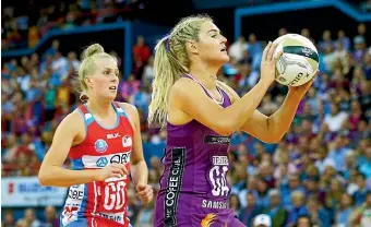  ?? GETTY IMAGES ?? The Firebirds put on a great show for netball fans, beating the Swifts by the skin of their teeth in extra time during the TransTasma­n Netball League final.