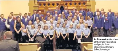  ??  ?? In fine voicemembe­rs of the male voice choir and pupils from Stonehouse Primary School on stage