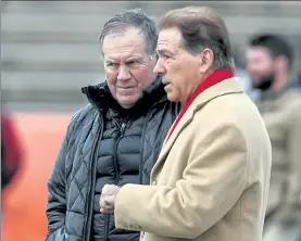 ?? AP ?? With his New England Patriots not in the Super Bowl, Bill Belichick was talking with Alabama head coach Nick Saban during practice for the Senior Bowl on Wednesday in Mobile, Ala.