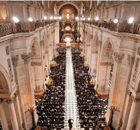  ?? Paul Childs - WPA Pool/Getty Images ?? A service of prayer and reflection for the life of Queen Elizabeth II was held at St Paul’s Cathedral. Below, members of the public arriving at the cathedral