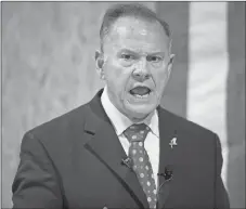  ?? AP PHOTO ?? Most statewide Republican officehold­ers in Alabama say they’re voting for Roy Moore (above) for U.S. Senate, but the state’s senior U.S. Sen. Richard Shelby didn’t vote for Moore. Polls show Moore in a tight race with Democrat Doug Jones.