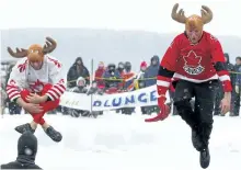  ?? CLIFFORD SKARSTEDT/EXAMINER FILES ?? Plungers wearing moose heads take an icy dip during the 37th annual BEL Rotary Annual Polar Plunge on Feb. 5 on Chemong Lake in Ennismore. Organizers are seeking entrants for this year’s plunge taking place Feb. 4 starting at 2 p.m.