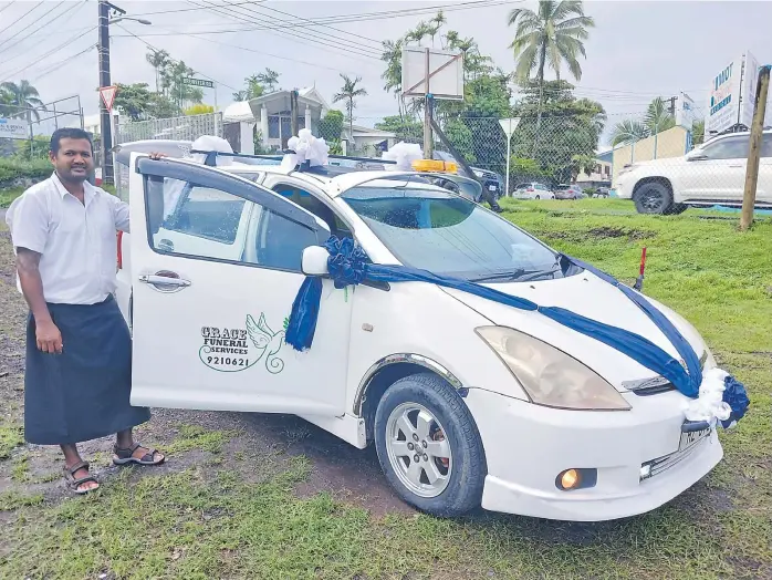  ?? Picture: ZIFIRAH VUNILEBA ?? Sanjay Dutt stands by the Toyota Wish at their outlet in Toorak, Suva.