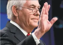  ?? Andrew Harnik / Associated Press ?? Secretary of State Rex Tillerson waves goodbye to reporters after speaking at a news conference at the State Department.