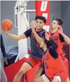  ?? EDDIE MOORE/JOURNAL ?? From left, UNM’s Javonte Johnson, Jaelen House and KJ Jenkins practice Oct. 1 at the Rudy Davalos practice facility.