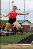  ?? DAVID C. TURBEN — FOR THE NEWS-HERALD ?? Mentor’s Paige Floriea wins the Division I Austintown-Fitch Regional long jump.