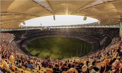  ?? Photograph: Paul Kane/Getty Images ?? Optus Stadium in Perth is set to host the 2021 AFL grand final should the MCG be ruled out as host.