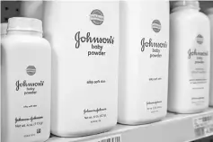  ??  ?? Bottles of Johnson &amp; Johnson baby powder line a drugstore shelf in New York.— Reuters photo