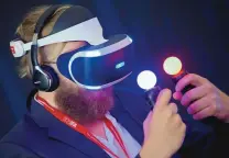  ?? THE ASSOCIATED PRESS ?? A man tests a Sony Project Morpheus Virtual Reality device after a press conference at the company’s stand at the IFA 2015 tech fair in Berlin, Germany.