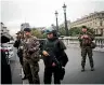  ??  ?? Armed police officers and soldiers patrol after a series of stabbings at the police headquarte­rs in Paris.