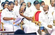  ?? ?? AIADMK coordinato­r O Panneersel­vam discussing with deputy coordinato­r R Vaithiling­am
