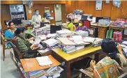  ?? ANI ?? Government employees work at state secretaria­t
■ office at 50% staff strength in Chennai yesterday.