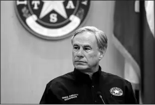  ?? JABIN BOTSFORD / WASHINGTON POST FILE ?? Texas Gov. Greg Abbott attends a security briefing at the Weslaco Department of Public Safety on June 30 in Weslaco, Texas.