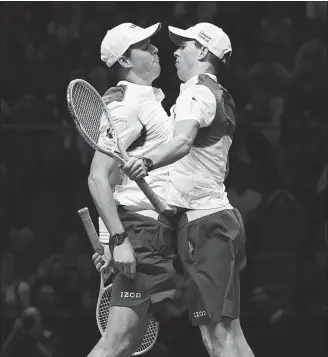  ?? REUTERS ?? Doubles duo Bob and Mike Bryan’s trademark chest-bump celebratio­n should be avoided on court when play resumes, the US Tennis Associatio­n has suggested.