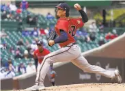  ?? Nuccio DiNuzzo / Getty Images ?? Kyle Wright, an unexpected starter for Atlanta, hit four Cubs on the way to a 52 Braves victory.