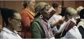  ??  ?? Fezekile Kuzwayo (centre) sings with the Durban Symphonic Choir.