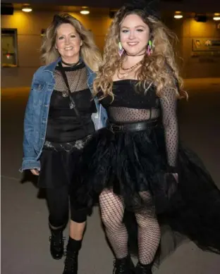  ?? Lucy Schaly/Post-Gazette ?? Nancy, left, and Kelly DeDomenic, both from Monroevill­e, dressed up for Madonna’s concert on Monday.