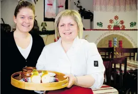  ?? PHOTOS: CJ KATZ ?? Inna Zapisotska, right, with her daughter Anna, is the owner Shynok Ukrainian restaurant,and serves a delicious array of authentic, homemade food.